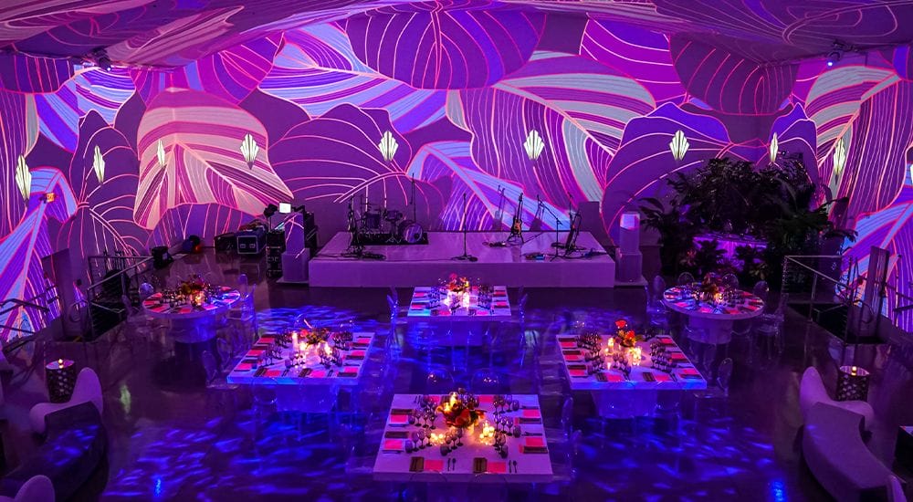 Vibrant immersive event space with digital projections and elegant decor in the UAE